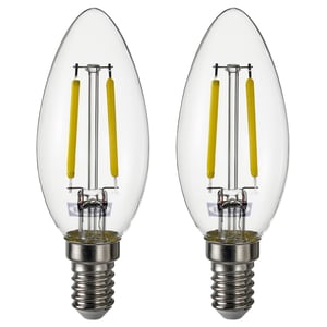 Twee warmwitte led-lampen met heldere glazen afdekkingen en zilveren voetstukken, naast elkaar.