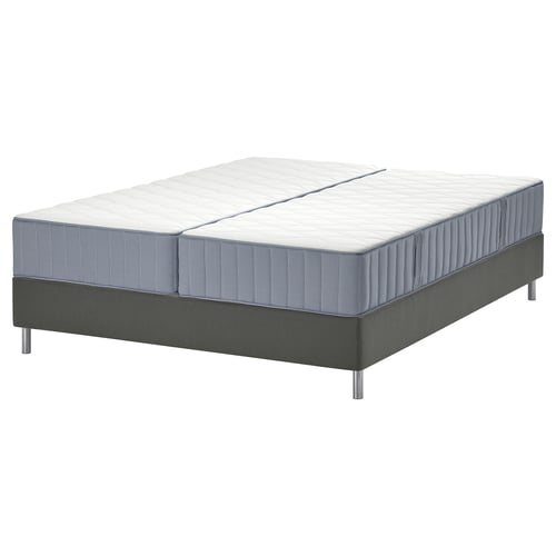 LYNGÖR bed base in grey with white vågstranda mattress, featuring 7 comfort zones and innovative pocket springs for support and air circulation.