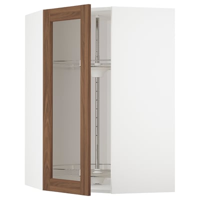 A white METOD kitchen cabinet with walnut-finished glass doors, featuring an adjustable shelf inside.