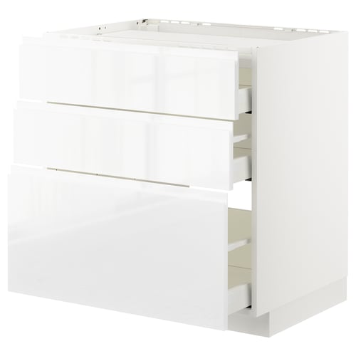 White modern kitchen cabinet, high gloss finish, 3 drawers partially open, sleek design.