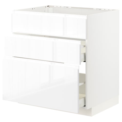 White METOD kitchen cabinet with sleek, glossy finish and smooth drawer slides.
