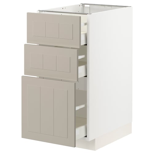 White ikea METOD kitchen unit with beige drawers and doors, rectangular shape, flat design.