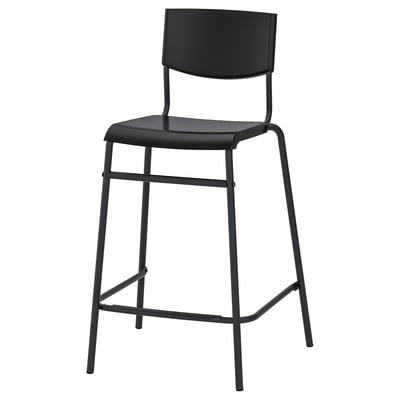 A black STIG bar stool with a metal frame and plastic seat/back, suitable for counter or kitchen island use.