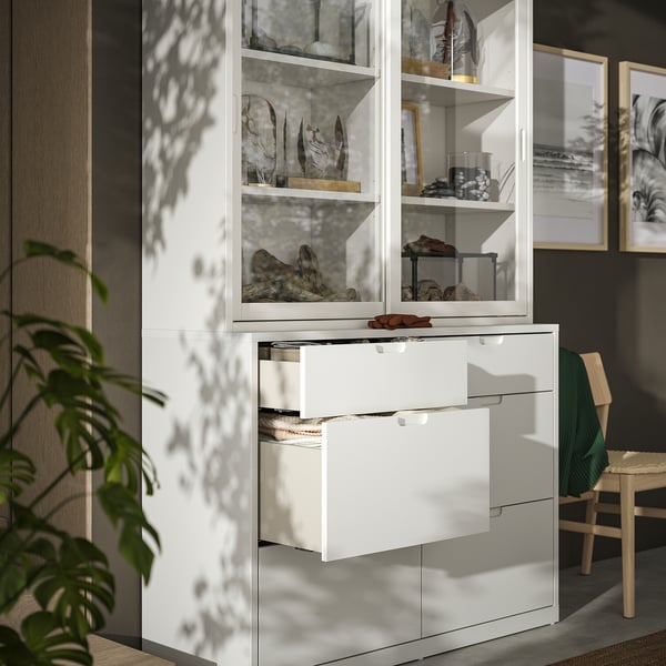 White TONSTAD cabinet set with drawers and glass display, modern minimalist design.