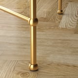 TORSJÖ Coffee table, gold effect/glass, 88 cm