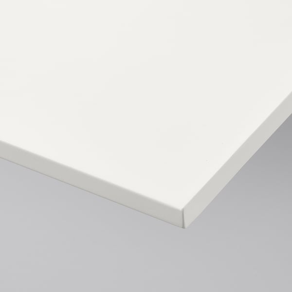 White wall shelf corner, sleek design, smooth finish.