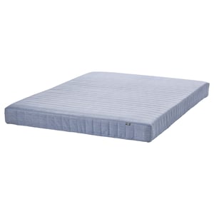 Blue IKEA VADSÖ extra-firm spring mattress, rectangular, with bonnell springs and polyester cover.