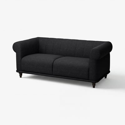 A VISKAFORS black sofa with classic rolled arms and a deep cushioned seat.