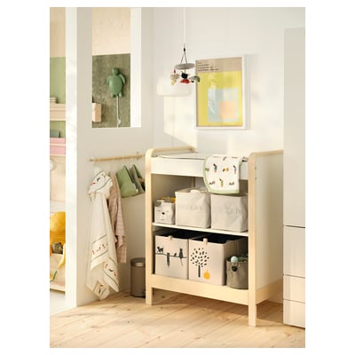 A white ÄLSKVÄRD changing table with light wood accents, featuring two shelves for storage.