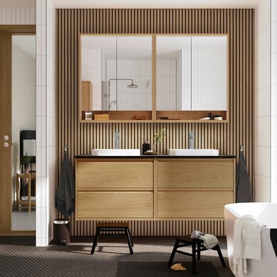 Modern bathroom ÄNGSJÖN double vanity in oak, two sinks, mirrors, and a sleek design.