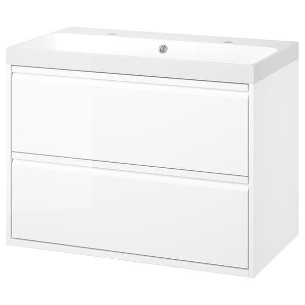 White modern bathroom cabinet with integrated handles and marble sink.