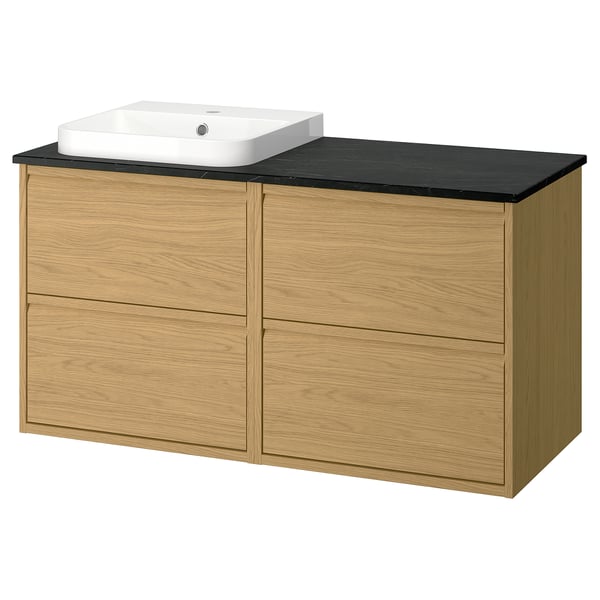 Modern oak vanity with black countertop, white basin, four drawers, sleek handles, wall-mounted.