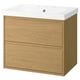 A white ceramic sink with light wooden cabinet, two drawers, minimalist design.