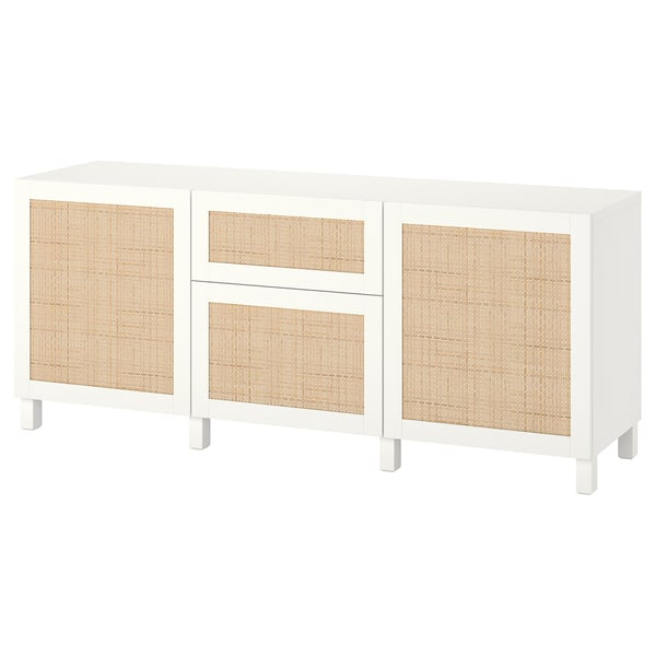 A white BESTÅ sideboard with woven bamboo panels and adjustable shelves, offering ample storage.