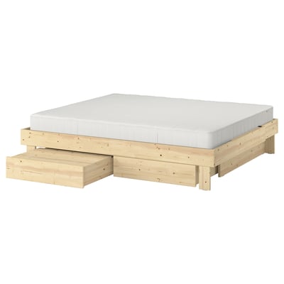 GLAMBERGET extendable bed with white mattress, wooden frame, two storage drawers.