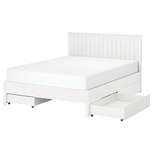A white GULLABERG bedframe with four storage drawers and a wooden headboard featuring vertical grooves.
