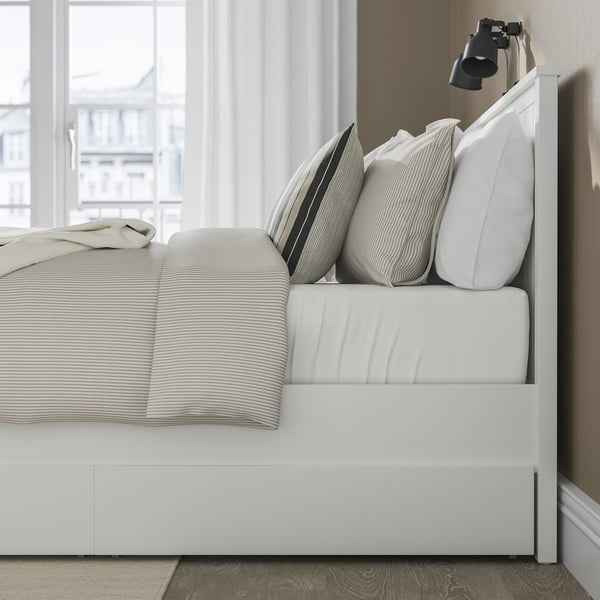 A GULLABERG bed frame with drawers and a slatted bed base, providing storage and mattress support.