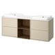 A HAVBÄCK beige vanity with double sinks and a central open shelf. It has a modern, minimalist design with wood-like cabinets.