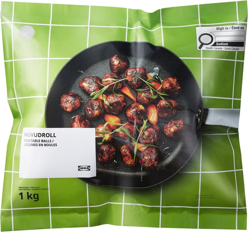 IKEAs HUVUDROLL vegetable balls packaging. Shows cooked vegetable balls in a pan with herbs.