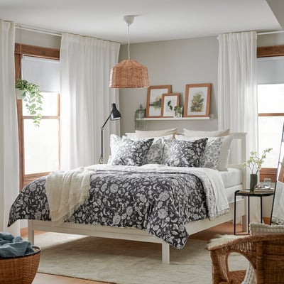 Elegant bedding with intricate floral patterns, showcasing high-quality fabric and detailed stitching.