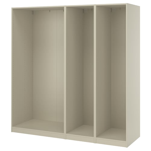 A white ikea PAX wardrobe frame. It is rectangular with three sections, designed for bedroom storage.