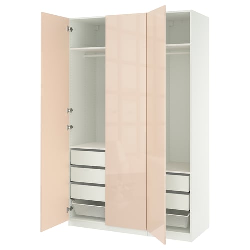Peach-colored PAX wardrobe with white interior, adjustable shelves and drawers.