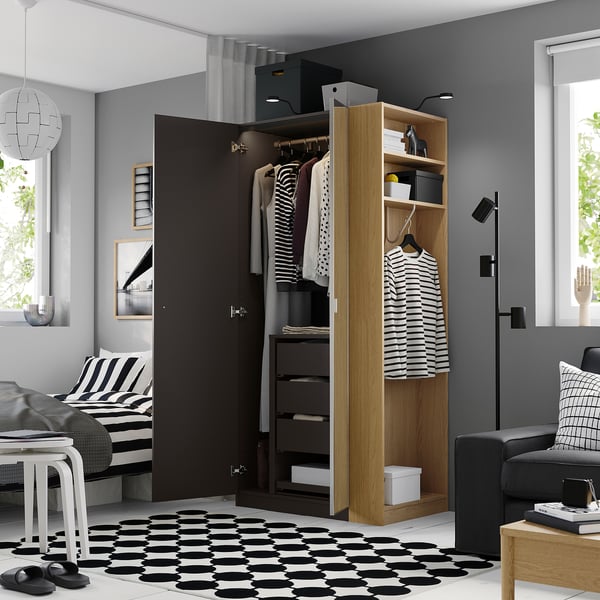 Sleek modern wardrobe with hanging clothes, shelves, drawers, adjustable feet, silent-closing hinges.
