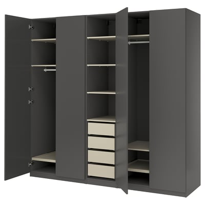 Modern grey PAX wardrobe with open doors, shelves, and drawers.