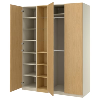 Light wood PAX wardrobe, open showing shelves & hanging space.