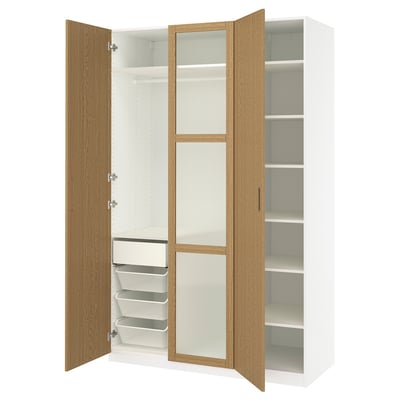 An open white and light wood PAX wardrobe with shelves and drawers.