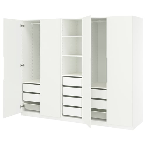 A white PAX wardrobe with open doors, revealing shelves and drawers.