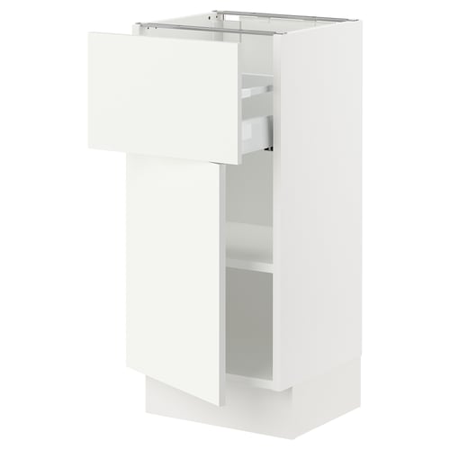 White SEKTION kitchen cabinet with adjustable shelves and reversible door.