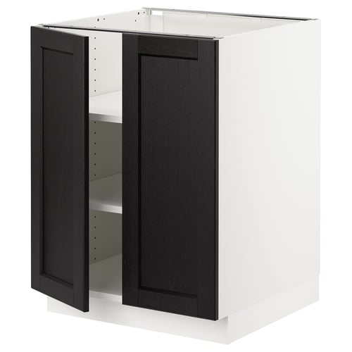 The SEKTION kitchen unit openable black-stained ash wood doors on a white frame, showcasing adjustable shelves and modern design.