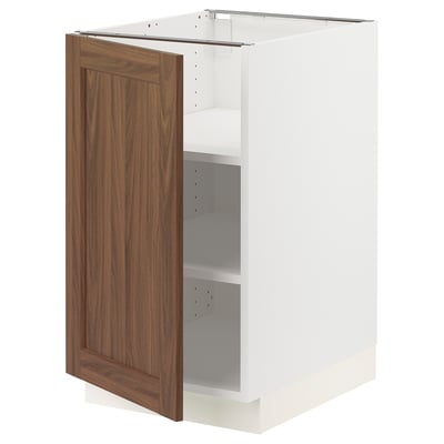 An ikea SEKTION kitchen cabinet with a white frame and a wooden door.