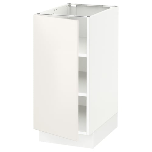 A white SEKTION kitchen cabinet with a single open door, featuring clean lines and adjustable shelves.