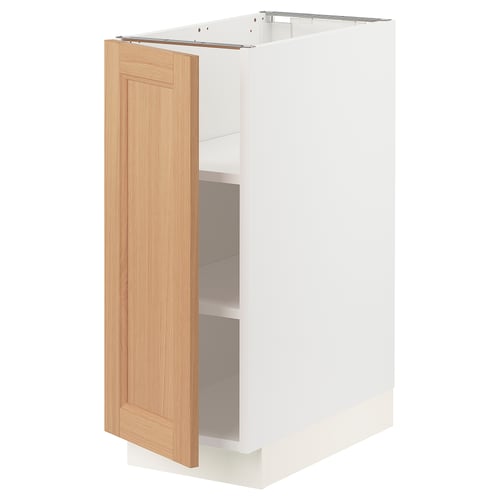 White kitchen cabinet with oak door, adjustable shelves.