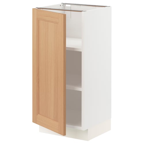 A white SEKTION kitchen cabinet with a light oak door, featuring an openable left or right hinge and adjustable shelves.