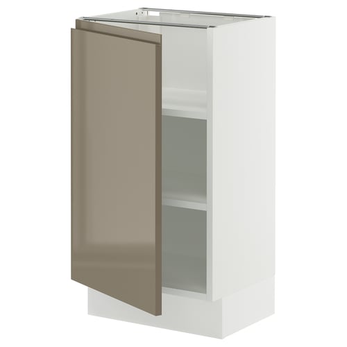 White cabinet with bronze door, glass shelf, sleek handles.