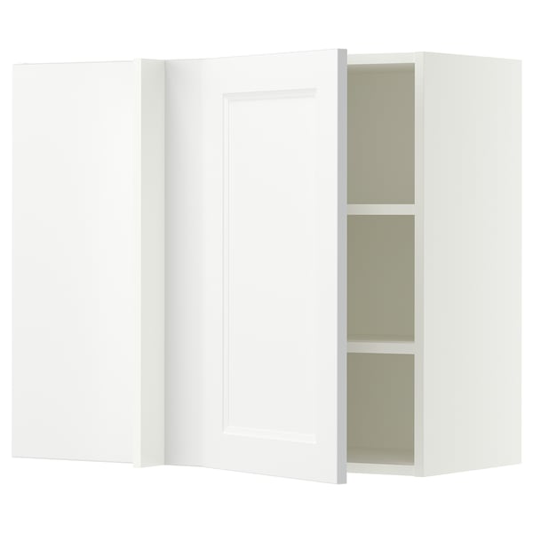 A white SEKTION kitchen cabinet with two open shelves. The cabinet is simple and modern with smooth lines and a minimalist design.