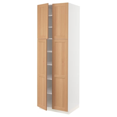 An ikea SEKTION kitchen cabinet. Its tall and rectangular with light wooden doors and a white frame, featuring a simple, modern design.