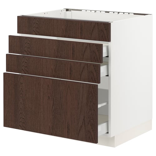 An ikea SEKTION kitchen cabinet with four dark brown wooden drawers on a white base.