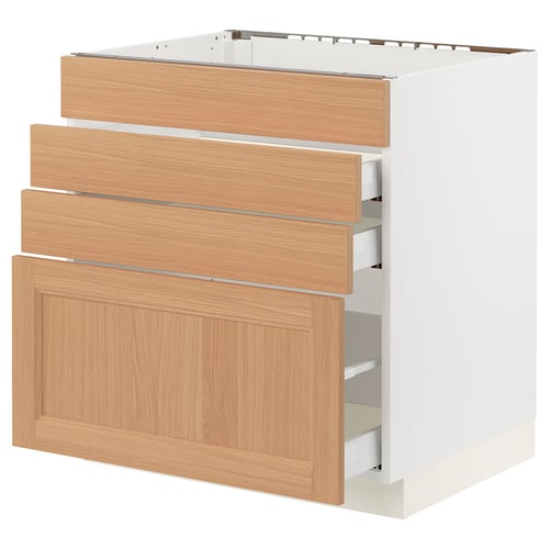 A SEKTION kitchen unit with oak drawers. It four wooden drawers, including a larger cabinet door at the bottom, all in a light oak finish.