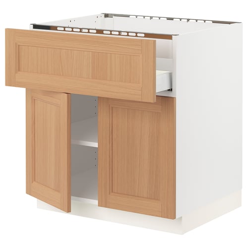 SEKTION oak wooden kitchen cabinet. Open door and drawer shown. White base.