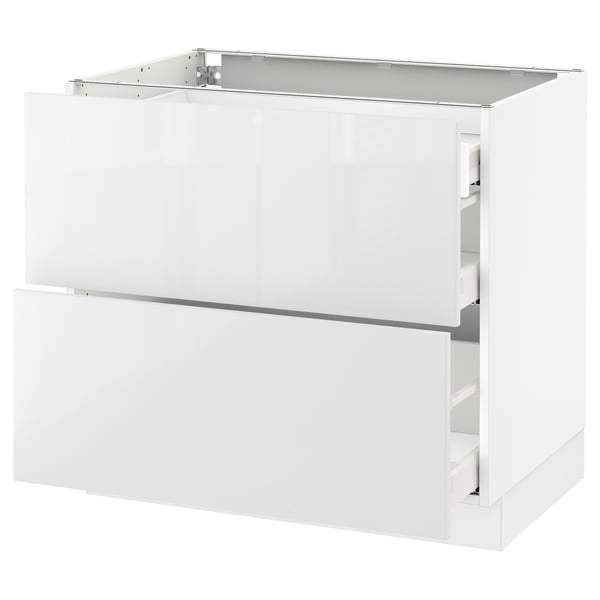 An ikea SEKTION white high-gloss kitchen cabinet with two drawers.
