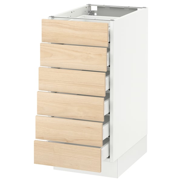 White kitchen cabinet with six light ash drawers, modern design.