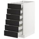 A white SEKTION kitchen cabinet with six black ash drawers.