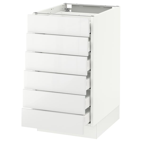 A white SEKTION kitchen cabinet with six smooth, high-gloss drawers.