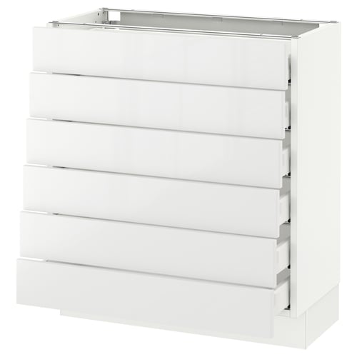 White SEKTION kitchen cabinet with six glossy drawers.