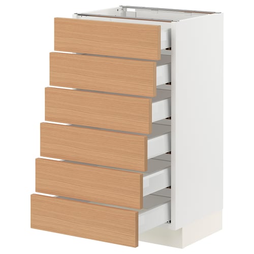 A SEKTION kitchen cabinet with six wooden drawers in a light oak finish and white frame, featuring a modern and sleek design.