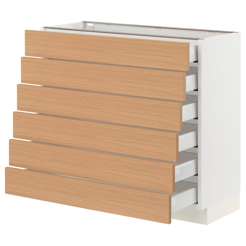 SEKTION kitchen cabinet in light wood, with multiple drawers, white frame, oak finishes.